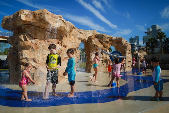 Kids play in the blue grotto splash area of Depot Park, site of the official grand opening celebration from 9 a.m.-noon Saturday at 220 SE Depot Ave. There will be live performances, children's activities, vendors, community groups and more. Rob C. Witzel/Special to the Guardian