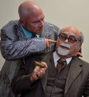 Larry Schnabel, of Deltona, stars as prosecutor Yusef El-Fayoumy, shown here interrogating witness Dr. Sigmund Freud, played by Barry Kite of Daytona Beach, in "The Last Days of Judas Iscariot." MIKE KITAIF