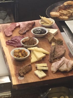 One of Mombo's charcuterie boards are enough for a light dinner. Photo by Rachel Forrest