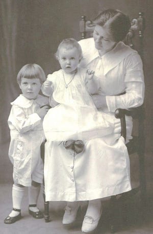 Barbara McCue is on her mother's lap in this 1919 photo taken in Boston.