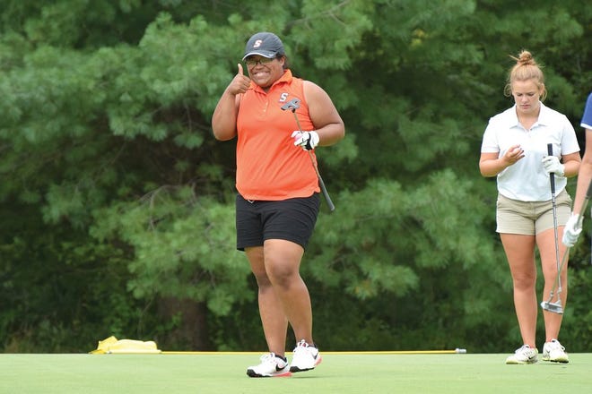 Rachel Webb shares a smile and a thumb-up Friday in her career-best round.