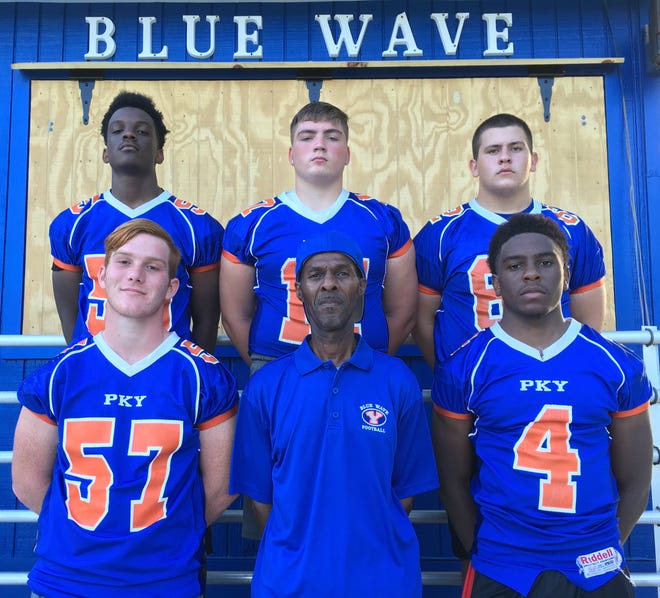 The P.K. Yonge Blue Wave are (left to right, back row): Bronson Jones, Dylan Mulhearn, Andrew Landers, (front row): Eric Smith, head coach Kent Johnson and Jevon Boswell.