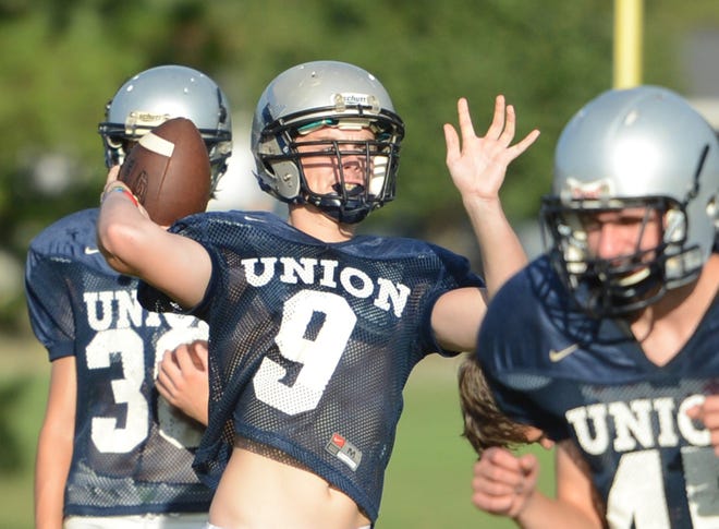 Union Christian quarterback Christian Snipes throws as the Eagles run through plays during practice on Aug. 3. Union Christian will play in the Oklahoma Christian School Athletic Association 8-man football league this season. BRIAN D. SANDERFORD/TIMES RECORD