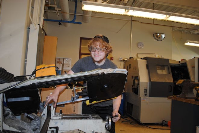 Dustin Rodrigues works in the prototype shop at the Center for Innovation and Entrepreneurship.