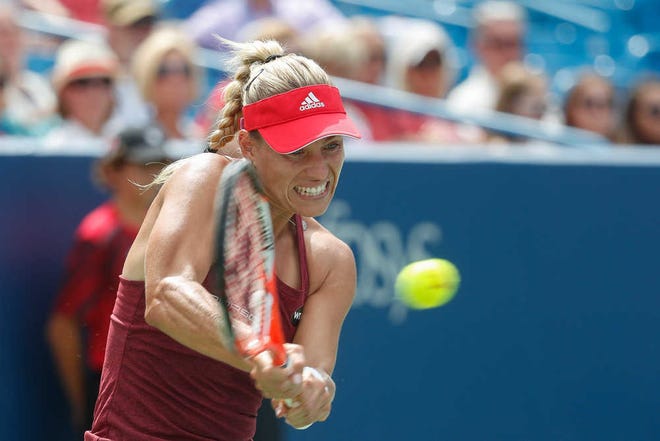 Angelique Kerber returns to Simona Halep during the semifinals of the Western & Southern Open tennis tournament on Saturday.