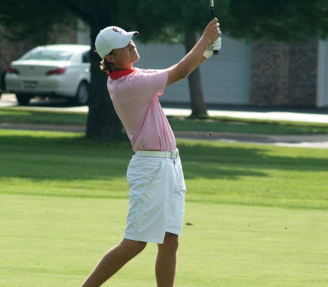 Pekin's Lance Hays swings during Thursday's match at Lick Creek Golf Course.