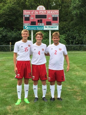 Brendan Guenther, left, Michael Geier and Tyler Goss are captains of the Pekin boys soccer team.