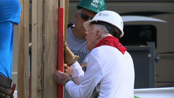 Former U.S. President Jimmy Carter, 91, helps build a home in Memphis, Tenn., for Habitat for Humanity. AP/Alex Sanz