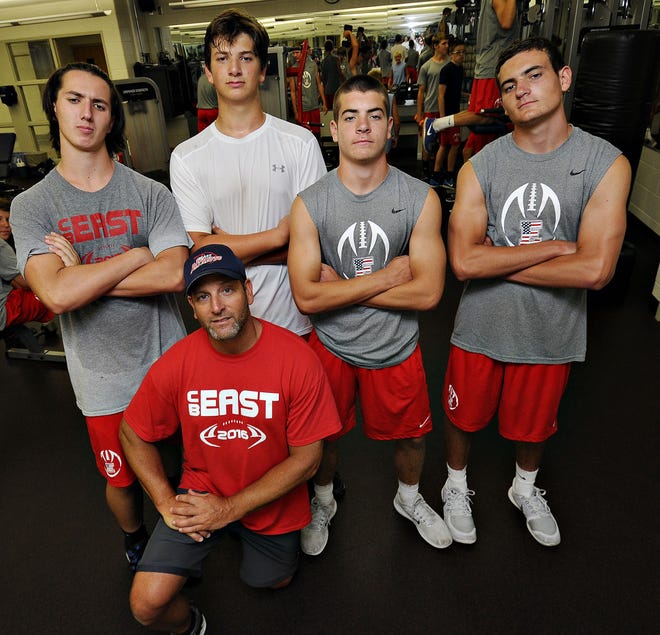The Ventrescas keep it all in the family at CB East. Coach Anthony Ventresca (front) with his two sons and two nephews on the team: Nate, Cody, Jake and Gavin together after a summer practice. Anthony was one of five brothers who played football at CB West.