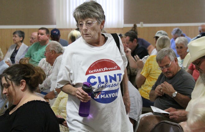 Judy Bergevine in a Mayor Clint Johnson T-shirt at the DeBary City Council meeting, Wednesday June 1, 2016 during a hearing to decide if Mayor Johnson violated the city charter and forfeted his office.   News-Journal/David Tucker