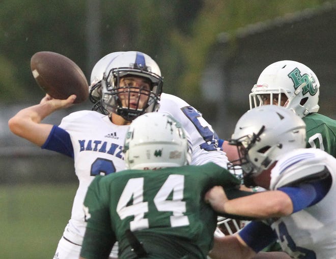 Matanzas quarterback Mackenzy Wagner (2) throws a pass under heavy pressure against Flagler Palm Coast during last year's game on Aug. 28. The Pirates prevailed, 14-7. This year's rematch is set for Friday at Matanzas. NEWS-TRIBUNE FILE/DAVID TUCKER