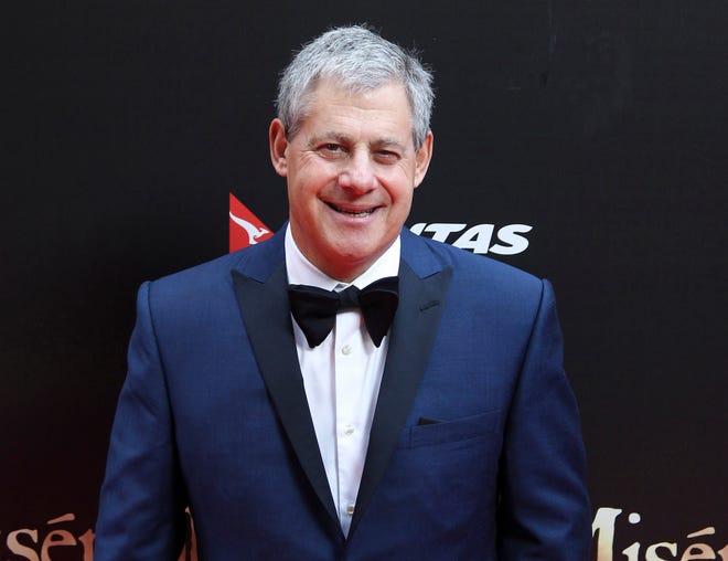Cameron Mackintosh, producer of the stage production of "Les Miserables" in Sydney, Australia for the premiere of the film version. American audiences will get the rare chance to catch a sneak peek of the new "Miss Saigon" before it opens on Broadway in the spring of 2017. They just have to go to a movie theater. Mackintosh said he didn't initially plan for a broadcast version of "Miss Saigon" but was persuaded to capture the 25th anniversary of its West End bow with a dozen cameras.