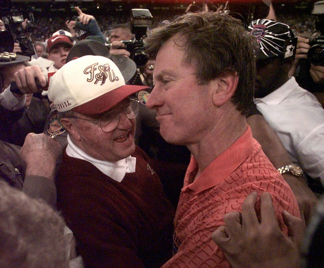 Florida State coach Bobby Bowden, left, congratulates Florida coach Steve Spurrier after UF won 52-20 in the Sugar Bowl at the Superdome in New Orleans on Jan. 2, 1997. The Gators and Seminoles met 12 times during the 1990s and the lowest ranking either team entered the game with was No. 11.
