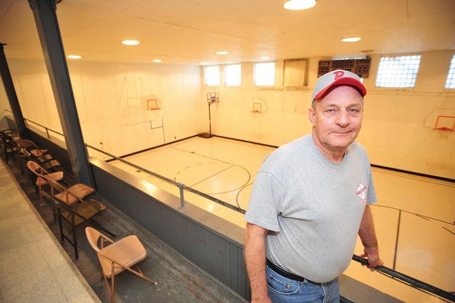 In this file photo Terry Brecher stands in the Pekin Union Mission, where he was the recreation and facilities director for 30 years before his retirement in 2009.