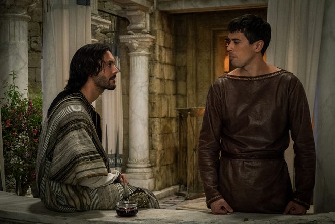 This image released by Paramount Pictures shows Jack Huston as Judah Ben-Hur, left, and Toby Kebbell as Messala Severus in a scene from "Ben-Hur." (Philippe Antonello/Paramount Pictures via AP)