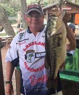Mike Nicknadarvich of the Lakeland Bassmasters caught this 9.10-pound bass on Lake Kissimmee in the club's June tournament. Bass over 8 1/2 pounds are pretty scarce now.
