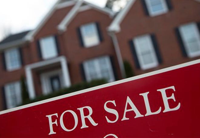 The local median home sale price - with half selling for more and half for less - was up over 13 percent to $204,850 from $181,200 a year ago. (AP file photo)