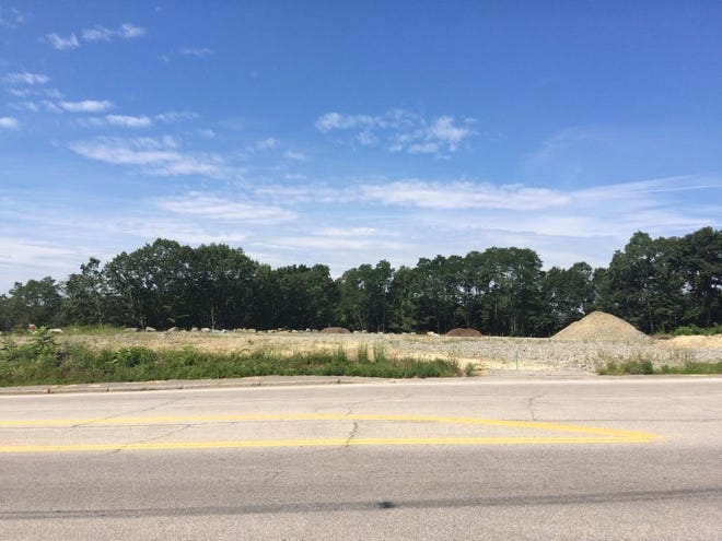 The empty lot off off Route 108 and Exit 7 of the Spaulding Turnpike may soon house a multi-building commercial development. Photo by Nik Beimler/Fosters.com
