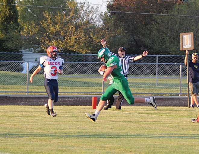 Wyatt Cool of Mendon finds his way into the end zone for one of his three touchdowns Thursday night.