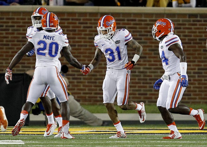 Florida cornerback Jalen Tabor (31) and tight end C'yontai Lewis have rejoined the team after a weeklong suspension. (Matt Stamey/The Gainesville Sun)