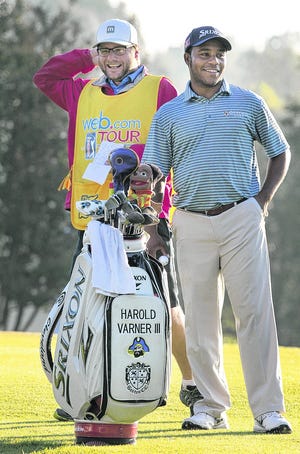 Former Forestview High School golfer Harold Varner III is shown with his caddie, Dale Valley, of Medicine Hat, Canada, during a September 2015 tournament at River Run golf course in Davidson. (Mike Hensdill/The Gazette)