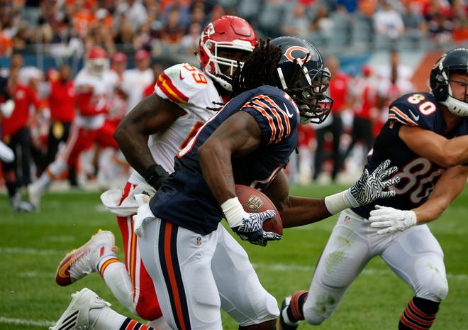 Chicago Bears wide receiver Kevin White (13) runs against Kansas City Chiefs linebacker Justin March (59) after receiving a pass during the first half of an NFL preseason football game, Saturday, Aug. 27, 2016, in Chicago. (AP Photo/Nam Y. Huh)