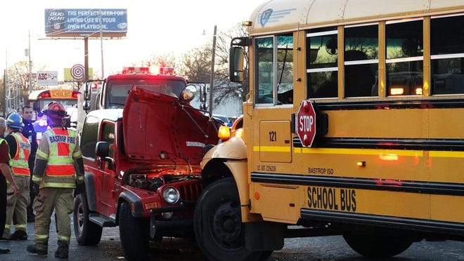 A school bus and a Jeep collided on College Street near Lovers Lane on Friday. JILLIAN BECK/BASTROP ADVERTISER