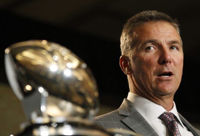 Ohio State head coach Urban Meyer speaks to the media at the Big Ten football media days, July 26, in Chicago. (AP Photo/Tae-Gyun Kim)
