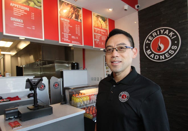 Ethan Kong is the franchise owner of the new Teriyaki Madness restaurant that's opening Wednesday in the Tarragona Shoppes complex just east of Mainland High School in Daytona Beach. NEWS-JOURNAL/DAVID TUCKER
