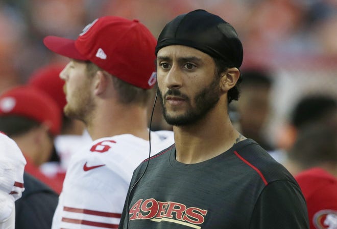 Sidelined on the 49ers depth chart, Colin Kaepernick has put himself front and center in the news cycle. 

 ASSOCIATED PRESS / JOE MAHONEY