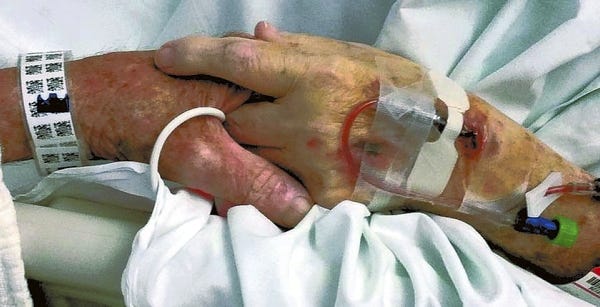 In their last days together in the hospital, Don and Margaret Livengood tried to hold hands as much as possible. Submitted photo courtesy of the Livengoods' family