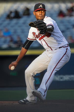 Atlanta Braves' Julio Teheran pitches against the San Diego Padres during the first inning of a baseball game, Tuesday, August 30, 2016, in Atlanta. (AP Photo/John Amis)