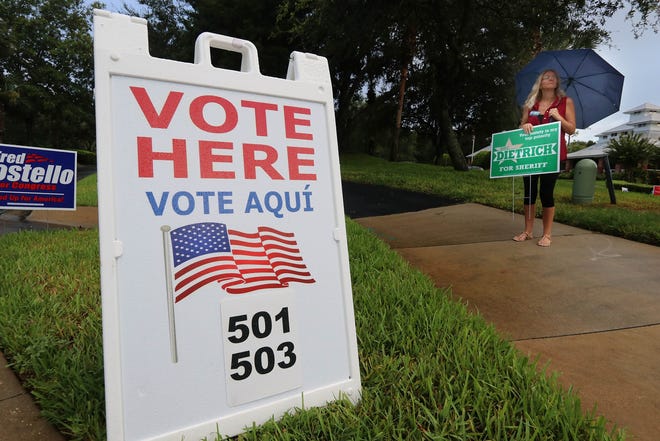 Voters head to cast their votes in Pine Lakes community center in Ormond Beach Tuesday morning August 30, 2016. News-Journal/JIM TILLER.
