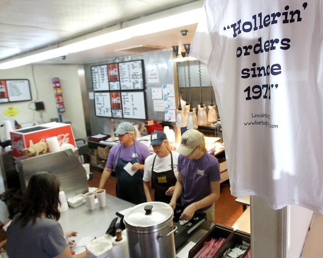 A special anniversary T-shirt hangs near the counter at Bar-B-Q King in Lincolnton. The restaurant is celebrating its 45th anniversary this week. JOHN CLARK/THE GAZETTE