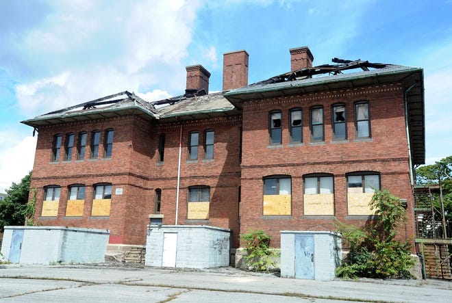 In the wake of a five-alarm fire that decimated the Coughlin School building on Aug. 22, the city has decided to tear the building down after the insurance company says it wouldn't put any money toward repairs.