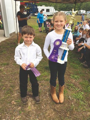 Evan Maciag, age seven, a second grade DeTour Arts and Technology Academy, won Reserve Grand Champion Meat Pen. Grand Champion Meat Pen went to Maraya Cairns, age eight, a fourth grade student at JKL Bahweting School in Sault Ste. Marie.