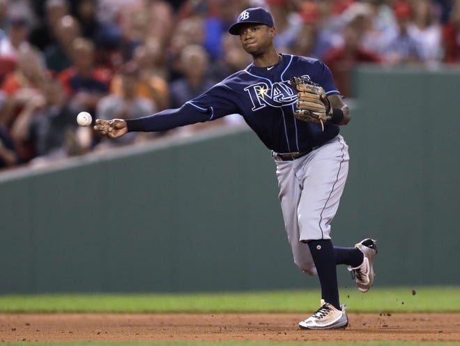 Tampa Bay Rays shortstop Tim Beckham fields a grounder during the seventh inning of a baseball game at Fenway Park on Tuesday in Boston. AP PHOTO / CHARLES KRUPA