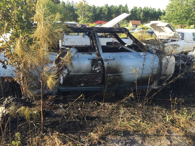 A fire Thursday at C & K Auto Sales and Salvage destroyed several cars. The salvage yard is known to many as "Cadillac Heaven" because of a large collections of Cadillacs from 1960 through 2010. HANNAH DELACOURT/STARNEWS