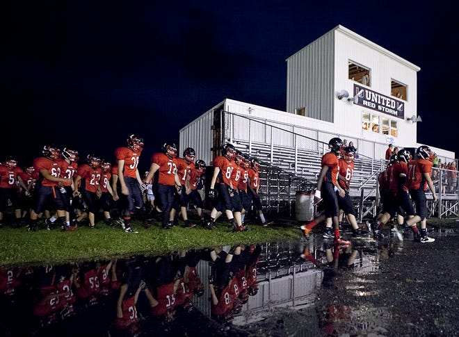 United players return from a severe weather delay during a game from the opening wek of the 2014 season. Week 1 of 2016 also saw weather delays across the area. STEVE DAVIS/WCI Sports