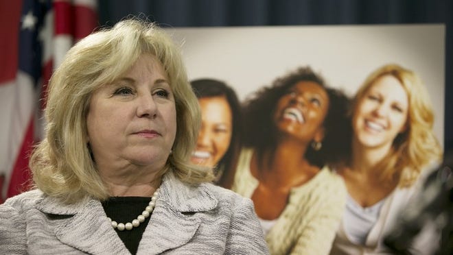State Sen. Jane Nelson listens to a speaker during a Capitol news conference to bring awareness to the state’s Healthy Texas Women program Monday.