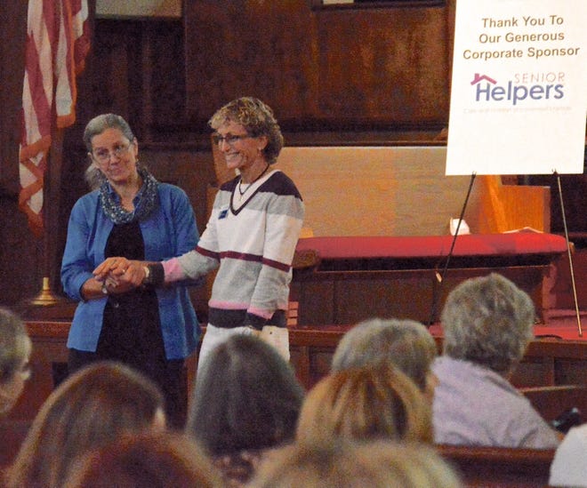 Teepa Snow (left), an occupational therapist and dementia and Alzheimer's care expert, addresses audience members at the Caregiver Conference hosted by the Alzheimer's and Dementia Resource Center based in Orlando. Photo provided.