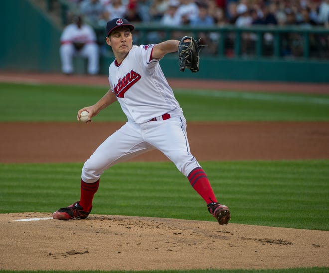 Cleveland Indians starting pitcher Trevor Bauer delivers to a Miami Marlins batter during the first inning of a baseball game in Cleveland, Saturday, Sept. 3, 2016. (AP Photo/Phil Long)