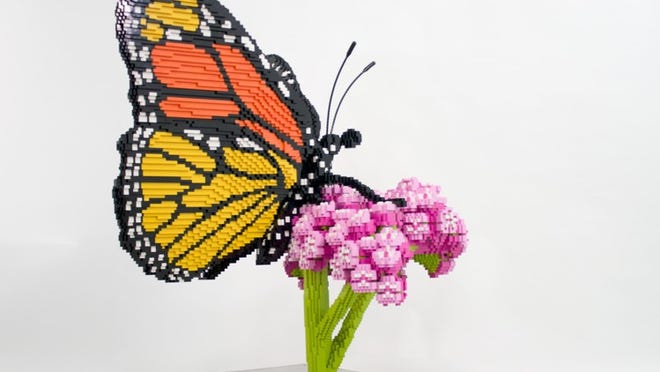 Sean Kenney’s Monarch on Milkweed is part of the “Nature Connects” exhibit of LEGO sculptures of wildlife on view Saturday through Feb. 14 at the Mounts Botanical Garden.