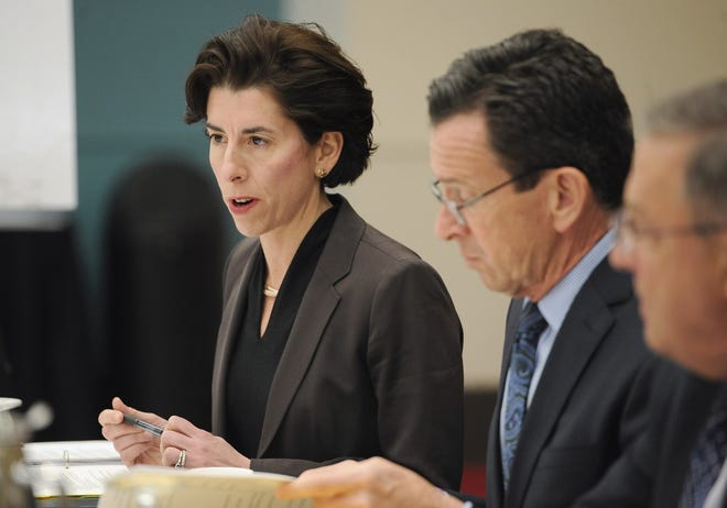 Governor Raimondo, left, speaks at a private lunch as Connecticut Gov. Dannel P. Malloy, center, and Maine Gov. Paul LePage, right, listen in Hartford, Conn., as New England's governors met in 2015 to talk about the region's increasing reliance on natural gas.