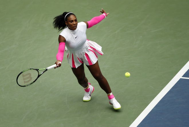 Serena Williams returns a shot to Yaroslava Shvedova, of Kazakhstan, during the fourth round of the U.S. Open tennis tournament Monday in New York. Associated Press/Adam Hunger