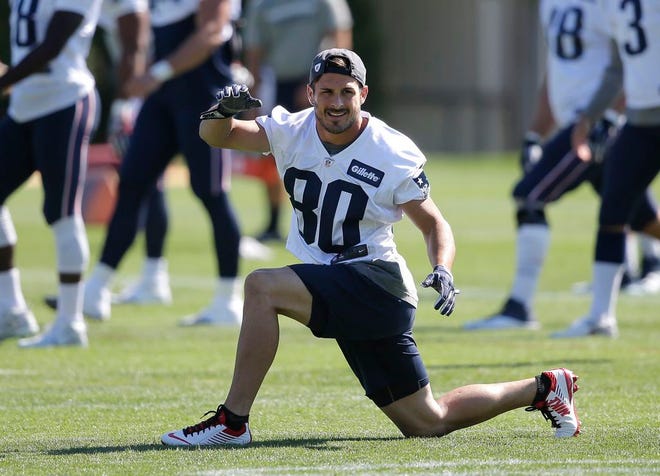 New England Patriots receiver Danny Amendola warms up on the field duringtraining camp Tuesday, Aug. 23, 2016, in Foxboro. The wide receiver, who has been dealing with knee and ankle issues, has been medically cleared to play.