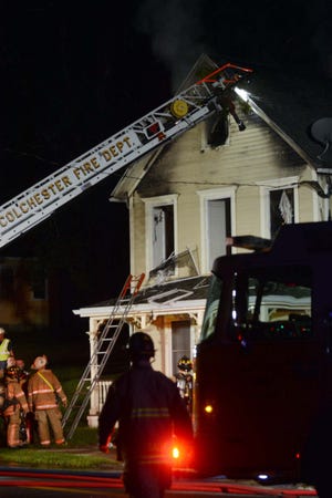 Firefighters battled a blaze at 32 Mill St., Colchester late Saturday night. Contributed
