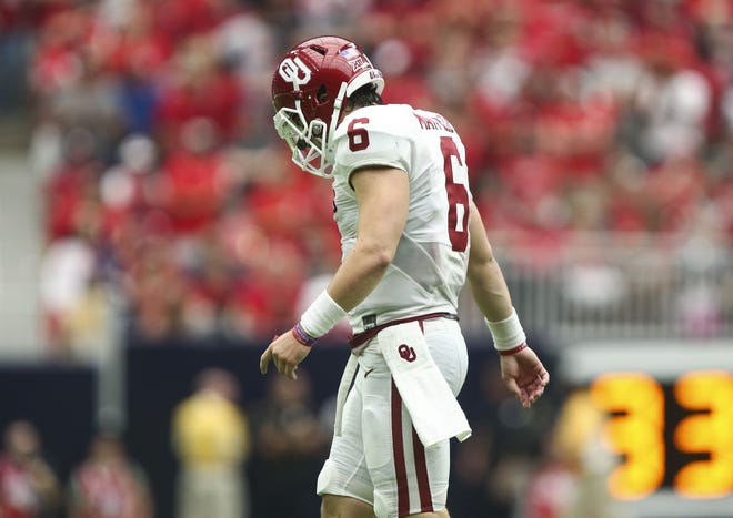 Oklahoma Sooners quarterback Baker Mayfield (6) walks off the field after a play during the fourth quarter against the Houston Cougars at NRG Stadium in Houston on Saturday, Sept. 3, 2016. Troy Taormina-USA TODAY Sports
