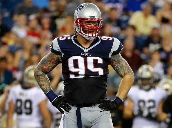 New England Patriots defensive end Chris Long during the first half of a preseason NFL football game against the New Orleans Saints Thursday, Aug. 11, 2016, in Foxborough, Mass. (AP Photo/Winslow Townson)