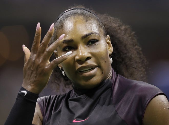 Serena Williams shows her nails after losing a point to Karolina Pliskova, of the Czech Republic, during Thursday night's women's semifinals match in New York. Charles Krupa/Associated Press